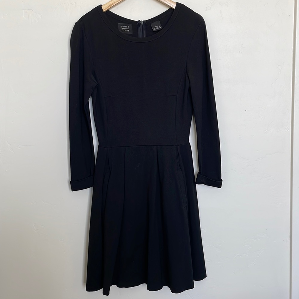 Black long sleeve press dress with pockets